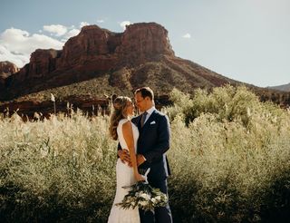 Bride & Groom by Mountains