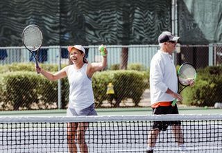 A Person Playing Tennis