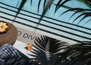 Poolside Cocktails and skylight view at The Aster Los Angeles members club