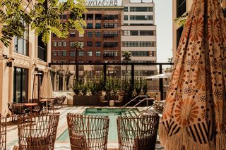 Outdoor Aster Park Lounge and Patio by the pool in the California sun