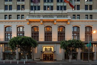 Exterior of Los Angeles Athletic Club at night.
